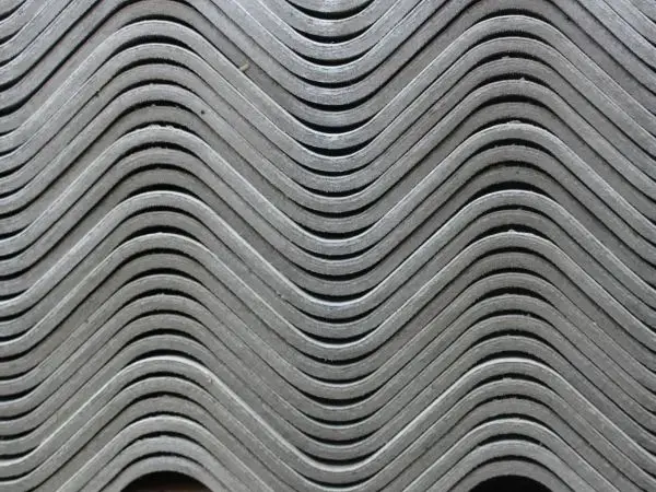 Nowoczesne rozwiązania dachowe: zalety używania cementowych dachówek